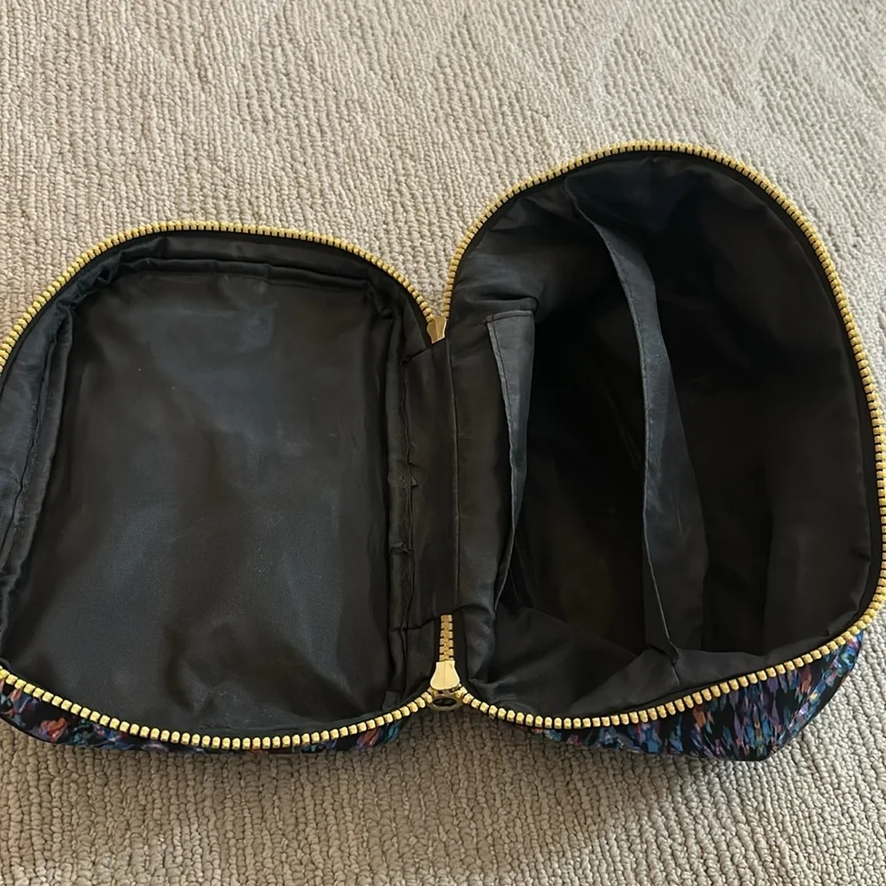 Nicole Miller multicolor cosmetic bag​